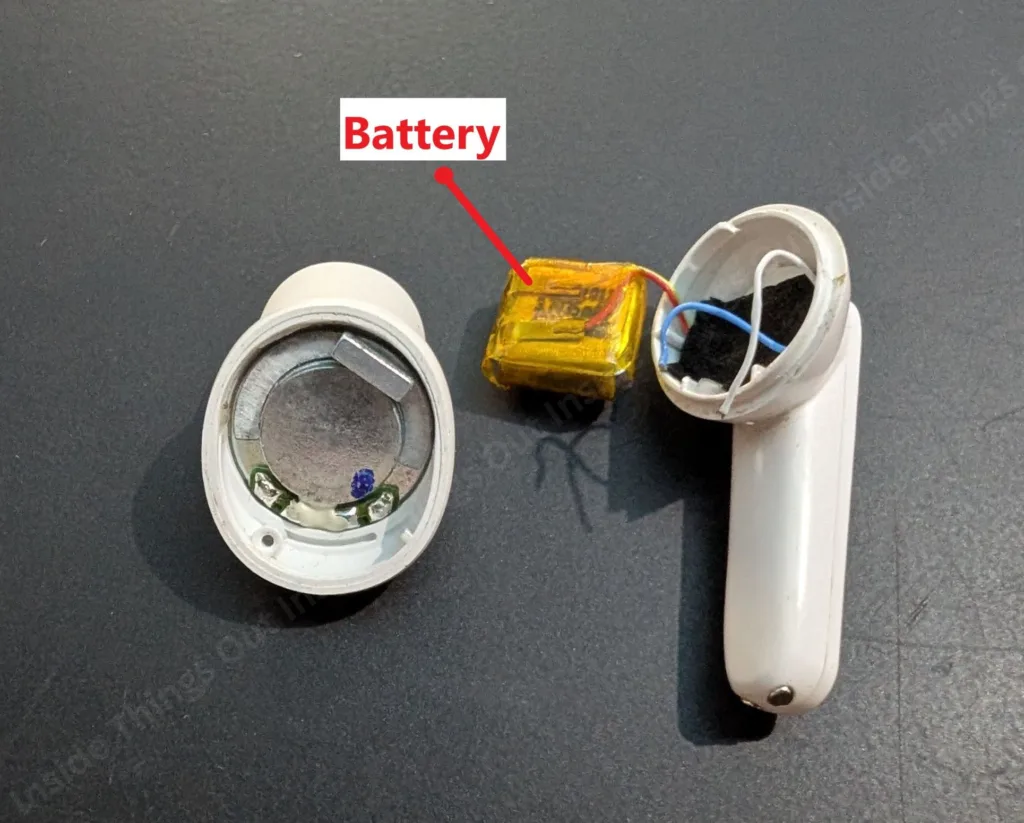 Battery Pack, Battery, Lithium ion Battery, Battery of Earbuds, Opened earbud with showing battery inside.